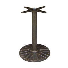 a metal table with an iron base and four wings on it's top, against a white background