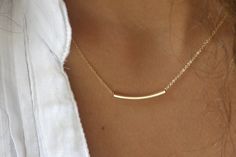 "The Golden Bar...or ... it is the thin things, sometimes the little simple necklaces turn to be my very favorite necklace,and i am so happy to share this necklace with YOU. Very Elegant and Delicate Necklace and... I LOVE IT ! ! ! The golden bar is about 1\" gold filled little curve as you see in the photos. *thin and light bar The golden bar is on a very delicate gold filled on 16\" gold filled chain. MADE WITH LOVE, SimaG \"\"\"\"\"\"\"\"\"\"\"\"\"\"\"\"\"\"\"\"\"\"\"\"\"\"\"\"\"\"\"\"\"\"\"\ Simple Necklace, Holy Mary, Delicate Necklace, Gold Bar Necklace, Bar Necklace, Skull Necklace, Virgin Mary, Necklace Choker, Gold Bar