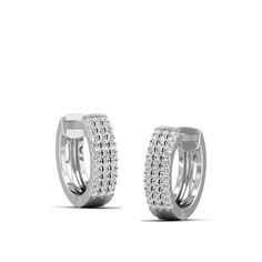 This elegant earrings feature triple rows of sparkling diamonds, adding a touch of luxury to any outfit. With superior craftsmanship and a secure huggie backing, these earrings provide both style and comfort. Elevate your look with these stunning diamond huggie earrings. Metal: 14K Gold Setting Type: Prong Rhodium Finish: Yes, on White Gold Natural Diamond Details: Weight: 0.17 Quantity: 66 Average Cut: Very Good Average Color: G-H Average Clarity: SI1-SI2 Treatment: None Ethically Sourced Diamo Diamond Huggie Earrings, Dance Jewelry, Earrings Metal, Birthstone Gifts, Ring Pendant Necklace, Huggie Earrings, Elevate Your Look, Elegant Earrings, Sparkle Diamonds