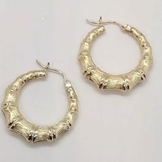 Hollow Hoop Bamboo Earrings 10k Yellow Gold Metal: Real 10k Yellow Gold( Stamped 10k) Condition: New Without Tags Approx.: 3g Size: Please See Pictures Yellow Gold Color, Bamboo Earrings, See Pictures, See Picture, Gold Metal, Gold Color, Jewelry Earrings, Hoop Earrings, Yellow Gold