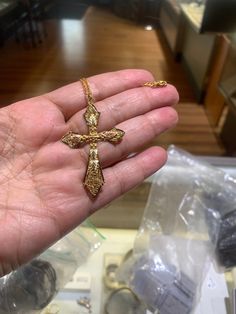 "Fabulous example of Black Hills tri colored gold jewelry! Produced in the Black Hills of South Dakota, this 10K/12K cross is typical of the Black Hills gold brand. Grape leaf motif and the three different hues of gold are distinctly the Black Hills design. A great gift idea! Mother's Day is coming up! This is a vintage pre owned cross, sold as is in like new condition. 18\" Black Hills gold 12K chain included. Free shipping in the USA!" Yellow Gold Crucifix Cross Necklace, Gold Plated, Yellow Gold Plated Crucifix Cross Necklace, Gold-plated Yellow Gold Crucifix Necklace, Yellow Gold Diamond Cut Crucifix Necklace, Gold Plated Yellow Gold Crucifix Necklace, 14k Gold Diamond Cut Cross Necklace, Gold Diamond Cut Cross Necklace, Gold Pendant Cross Necklace With Diamond Cut, Gold Diamond Cut Cross Pendant Necklace