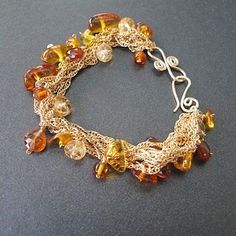 Bracelet 42 citrine, amber, and mandarin garnet on multi-strand chains Citrine Jewelry, Juno, Multi Strand, Bead Crafts, Bracelet Designs, Bronx, Wire Jewelry, Chain Bracelet, Beaded Bracelet