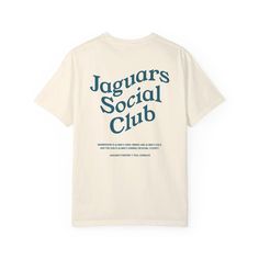 We've saved your spot in the Jaguars Social Club - where membership is always open, drinks are always cold, and the sun is always shining on Duval County.    Made from 100% ring-spun US cotton, this Comfort Colors unisex, crewneck t-shirt is both cozy and stylish. The fabric is pre-shrunk for a consistent fit and has double-needle stitching for durability.    Teal Sundaze is a locally owned brand that prides itself on offering unique designs perfect for your next tailgate, concert, or day at the School Merch Design Ideas, Club T Shirt Design Ideas, Club Tshirt Ideas, Club Tshirt Designs, Company Shirt Design, Company Tshirt Design, Social Club Aesthetic, Aesthetic Tshirt Design, Social Club Design