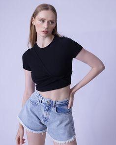 Rock the day in this slim-fit, casual twist front detailed crop top! Crafted from a cotton-spandex blend for medium stretch, you'll feel unstoppable! Throw it into the machine for a quick wash, or have it professionally dry cleaned! Trendy Stretch Top With Twist Front, Trendy Stretch Tops With Twist Front, Trendy Fitted Top With Twist Front, Trendy Fitted Tops With Twist Front, Trendy Stretch Twist Front Tops, Spring Cropped Twist Front Crop Top, Versatile Fitted Twist Front Tops, Fitted Twist Front Versatile Top, Chic Cropped Top With Twist Front