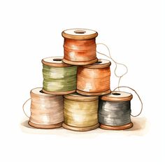 several spools of thread sitting on top of each other