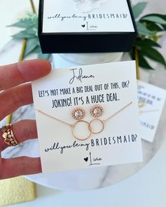 This wedding-themed gift set offers a choice of Rose Gold, Gold or Silver Cubic Zircon studs and an infinity necklace fashioned from stainless steel, which is lead-free, nickel-free and hypoallergenic. It is part of our Bridal Party Gift Set Collection, perfect for thanking your bridesmaids or asking them to be part of your special day. Would you like to personalize the cards? There is a box at the check out window for you to enter the personalization for the cards! You can also message me any r Rose Gold Jewelry Set For Valentine's Day Gift, Round Jewelry Sets For Mother's Day Gift, Adjustable Wedding Jewelry With Gift Box, Round Wedding Jewelry With Gift Box, Rose Gold Jewelry With Gift Box, Rose Gold Jewelry Sets For Gifts, Rose Gold Nickel-free Necklaces For Wedding, Personalized Rose Gold Jewelry For Wedding Gift, Rose Gold Jewelry In Gift Box For Wedding