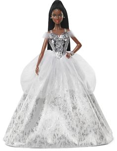 a barbie doll dressed in a white and silver ball gown with black hair wearing a tiara