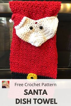 a crocheted santa dish towel hanging from a hook with the words free crochet pattern