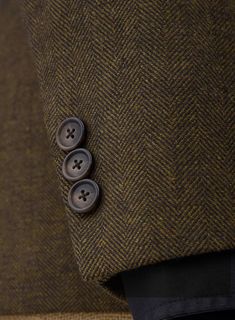 Wish you had an alternative to the countless charcoal grey and navy suits you continually wear to work, social events and weddings? Look no further than our Bottle Brown Herringbone Tweed Suit. Crafted from wool, the brown suit features a herringbone pattern that brings a breath of fresh air into it, while the tweed fabric makes it a perfect choice for wintry weather. Simply team it up with a white shirt and polished black shoes to achieve this look.  
 
Look Includes   Bottle Brown Herringbone Wool Suits With Herringbone Pattern For Business Casual, Classic Herringbone Suit For Semi-formal Occasions, Classic Semi-formal Suit With Herringbone Pattern, Classic Semi-formal Herringbone Suit, Brown Wool Suit With Herringbone Pattern, Brown Tweed Suit With Herringbone Pattern, Formal Tweed Blazer With Herringbone Pattern, Tailored Brown Tweed Jacket With Pressed Crease, Brown Tweed Jacket With Herringbone Pattern And Suit Collar