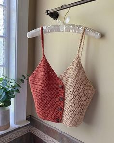 two tone mauve and off white crochet top by crocheting for clout. top is hanging on silk hanger Outfit Rajut, Crochet Crop Top Outfit, Black Designers, Diy Crochet Top, Black Crochet Top, Summer Knitting Patterns, Crochet Pieces, Crochet Top Outfit, Crochet One Piece