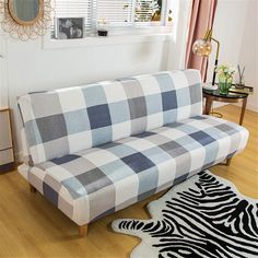 PRICES MAY VARY. 【Soft & Elastic Material】92% polyester fiber + 8% spandex 【Applicable Size】Fit for sofa length 70.87-82.68 inch; Sofa width 21.65-25.59 inch; Backrest height 21.65-25.59 inch; Sofa cushion thickness 7.87-11.81 inch 【Rich Patterns】The product adopts environmental protection reactive dye making process. It has bright patterns, soft fabric, 360 degree all-cover stretch band design, offering you perfect enjoyment. 【Easy Installation & Care】The sofa cover is made of highly stretchabl Type Of Sofa, Folding Couch, Unique Sofa, Futon Cover, Sofa Style, Unique Sofas, Futon Covers, Old Sofa, Armless Sofa