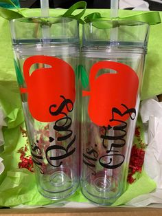 two personalized tumblers sitting on top of each other