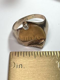 . Vintage Signet ring that would be great on a man or a woman. Circa 1960 14 yellow gold with a 0.10 carat round brilliant cut diamond I-SI1. Size 10.25. Very comfortable. 8.00 grams 14k yellow gold and diamond Size 10.25 Modernist White Gold Signet Ring For Anniversary, Modernist 14k Gold Ring For Formal Occasions, Rose Gold Signet Ring With Single Diamond, Formal Modernist 14k Gold Ring, Classic Rose Gold Diamond Ring Stamped 14k, 14k Gold Signet Ring With Single Diamond, Modernist 14k Gold Hallmarked Rings, Modernist Diamond Ring For Formal Occasions, Classic Diamond White 14k Stamped Signet Ring