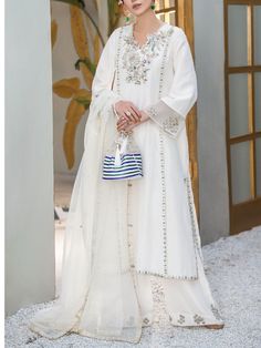 ✨This beautiful white silk long kurta has zari,beads and mirror work over the neck and sleeves and front pannel It has Palazzo pant with motifs and the bottom of the pant,it has orgenza dupatta with lace border and booties on the border of the dupatta. ✨Dazzle with this elegant outfit in any party or wedding function. ✨We stitched outfit with lot of care, so that our customers should not have any issues regarding finishing and fitting. ✨This dress can be customise in any other colour and in all Long Kameez, Designer Salwar, Embroidered Pants, Designer Salwar Suits, Wedding Function, Plus Size Designers, Elegantes Outfit, Salwar Suit, Star Dress