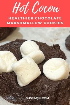 chocolate cookies with marshmallows on top and text overlay reading hot cocoa healthier chocolate marshmallow cookies