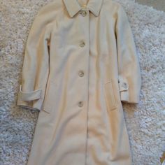 Gorgeous Vintage 100% Cashmere Coat By Regency Cashmere. Oversized Look. Tag-Large But Fit Both Large And Medium Is A Lovely Cream Color In A Med Weight Cashmere Which Is Amazingly Soft & Luxurious. Classic Button Front Coat W/Notched Collar, Wrist Length Sleeves W/Decorative Single Buttons. Full Length Fit-I'm 5'4",This Comes To My Lower Calf. Beautiful Inverted Back Pleat Creating A Lovely Full Swing. Has A Couple Light Brown Small Spots As Seen In Photo On Front Of Coat. Beige Wool Outerwear For Daywear, White Vintage Outerwear For Formal Occasions, Vintage White Formal Outerwear, White Vintage Formal Outerwear, Classic Cream Outerwear For Daywear, Vintage Outerwear For Winter Daywear, Vintage Beige Outerwear For Daywear, Classic Fitted Outerwear For Daywear, Cashmere Jacket