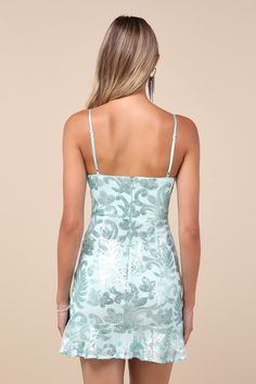 The Lulus Vivacious Energy Mint Blue Sequin Sleeveless Mini Dress is ready to mesmerize everyone you meet! Sheer mesh fabric (atop a matching knit liner) is embellished with a shimmering sequin design as it shapes a darted bodice and a V-neckline with a supportive V-bar, all supported by adjustable spaghetti straps. The high, fitted waist tops a bodycon mini skirt that finishes with a flirty ruffled hem. Hidden back zipper/clasp. Fit: This garment fits true to size. Length: Mid-thigh. Size mediu Mint Blue Dress, Sequin Homecoming Dress, Sequin Design, Adhesive Bra, Sparkly Dress, Mint Blue, Night Out Dress, Lulu Dresses, Hoco Dresses