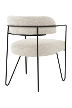 a white chair with black legs and a round seat on it's backrest