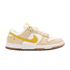 Find NIKE Wmns Dunk Low 'lemon Drop on Editorialist. The Nike women’s Dunk Low ‘Lemon Drop’ gives the ‘80s hoops shoe a summery makeover. The sneaker utilizes a white tumbled leather upper with subdued yellow overlays that recall the color of lemon flesh, while a zestier shade of yellow is applied to the rind-like leather Swoosh. An overt nod to the citrus fruit takes the form of an embroidered graphic on the lateral heel. Additional unique details include a breathable open-mesh tongue and translucent rubber outsole. Wmns Dunk Low, Yellow Nikes, Lemon Drop, Citrus Fruit, Shades Of Yellow, Drop In, Dunk Low, The 80s, Nike Women