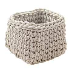 a white basket that is made out of woven material with braiding on the sides