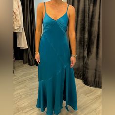 Emerald Blue Satin Gown. Perfect Wedding Guest Dress. Never Worn. Bought From A Boutique Size Small. Ties Into A Bow In The Back. Blue Bias Cut Maxi Dress For Prom, Blue V-neck Bias Cut Maxi Dress, Blue Gown For Wedding Guest And Prom Season, Blue Gown For Wedding Guest Or Prom, Blue Gown For Wedding Guest During Prom Season, Blue Gown For Wedding Guest And Prom, Blue Satin Bias-cut Gown, Blue Bias Cut Gown For Party, Blue Fitted Gown With Bias Cut