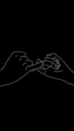 two hands reaching out to each other with their fingers extended in front of them, against a black background