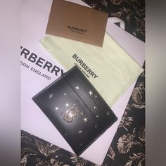 Brand New Never Used Leather Purchased W/Tag Inside Comes W/Dust Bag 2 Front And 2 Back Slip Pockets 1 Center Pocket Burberry Black, Burberry Accessories, Key Card Holder, Card Holders, Star Print, Card Case, Black Silver, Burberry, Dust Bag