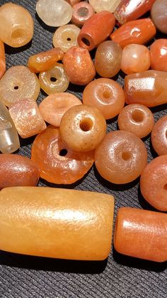 A beautiful beads from my collections of ancient beads very old around 2500 years to 3500 . A beautiful collection of very old ancient Agate Beads, and jasper . They are found in Afghanistan, India, Pakistan and Tibet. They can be used to make a beautiful contemporary designed necklaces. Each bead is authentic and old. Highly collectible 9 pictures are there you can swipe each to see all pictures Orange Round Beads For Jewelry Making, Polished Amber Beads For Jewelry Making, Orange Natural Stones For Jewelry Making, Handmade Amber Round Beads, Handmade Amber Beads, Carnelian Oval Beads For Jewelry Making, Carnelian Gemstone Round Beads, Orange Polished Beads For Jewelry Making, Oval Carnelian Beads For Jewelry Making