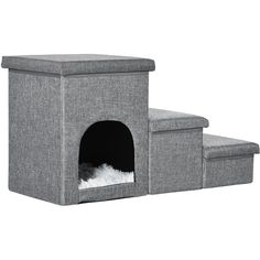 the cat house is made from grey fabric