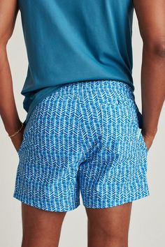 Riviera Recycled Swim Trunks | Bonobos Sporty Blue Bottoms For Travel, Blue Travel Shorts, Travel Shorts With Elastic Waistband, Blue Travel Bottoms With Pockets, Sporty Cotton Shorts With Functional Pockets, Blue Bottoms With Pockets For Travel, Functional Relaxed Fit Swim Trunks With Pockets, Relaxed Fit Travel Shorts With Pockets, Navy Shorts