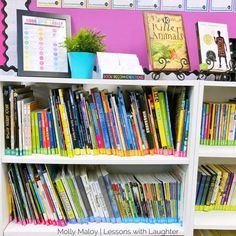 a bookshelf filled with lots of colorful books