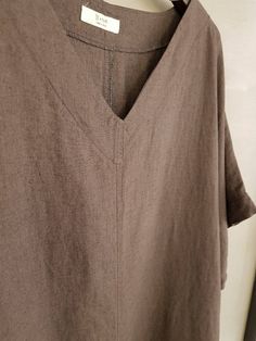 "100% organic linen short sleeve with batwing design dress, cool and lightweight Sustainable linen quality and steady seller design Essential item for vacation Size One size fit to all, loose fit, Good for US size 4-12 Below knee Length 109cm /43\" Chest width 66cm /26\" *Model 170cm/5'7\" Fabric and care 100% linen cotton Machine washable and tumble dry Made in S Korea" Casual Brown Linen Dress With Relaxed Fit, Casual Linen Dress With Short Sleeves, Casual Short Sleeve Linen Dress, Short Sleeve Linen Dress For Vacation, Vacation Linen Dress With Short Sleeves And Relaxed Fit, Relaxed Fit Short Sleeve Linen Dress For Vacation, Oversized Linen Dress With Short Sleeves For Vacation, Solid Color Short Sleeve Linen Beach Dress, Solid Short Sleeve Linen Beach Dress