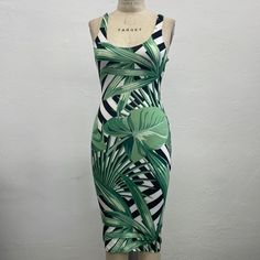 Brand New Green Bodycon Dress For Vacation, Fitted Black Dress With Tropical Print, Black Tropical Dress For Spring, Casual Green Bodycon Dress For Vacation, Chic Green Bodycon Dress For Vacation, Green Sleeveless Midi Dress With Tropical Print, Chic Fitted Midi Dress With Tropical Print, Fitted Tropical Print Midi Dress, Chic Green Tropical Print Midi Dress