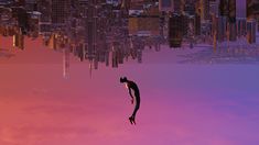 a man floating in the air above a city at sunset with buildings and skyscrapers