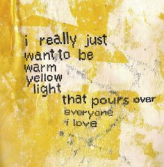 a yellow and white wall with some words written on it, including one in the middle