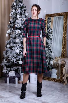 - Soft plaid fabric - Midi length (115 cm or 45 in), custom length available - Round back with zipper - 3/4 sleeves (17 in or 40 cm) - Side seam poskets - Flared skirt - NOTE! Belt isn't included Can be made in plus sizes, junior bridesmaids and in maternity style. If measurements don`t match any size in my chart, I highly recommend a custom fit. Visit my FAQ section for required measurements. 5 unique colors for your choice (are given on photo) or you can request a custom color. To see colors i Fitted Midi Length Plaid Dress, Plaid Midi Length Dress For Work, Workwear Midi Length Plaid Dress, Fall Plaid Dress With Short Sleeves, Plaid Cocktail Dress, Red Tartan Skirt, Red Long Skirt, Long Plaid Skirt, Green Plaid Dress