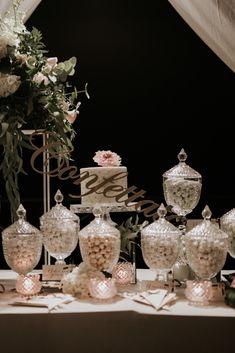 a table topped with lots of candy and candies