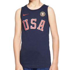 a young boy wearing a usa basketball jersey