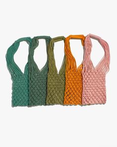 Our line of Kokoro Original products infuses practical purpose with warmth and style, honouring both the aesthetic and tradition of Japanese Craftsmanship. This hand-woven crocheted bag makes a beautiful grocery tote or picnic bag. Size: Approx. 13" H (10" Drop) x 11.5" W Size: Length with Shoulder Straps: 25" Material: 100% Cotton Made in Vietnam Product # KKR03 Code: NWS Green Hand-knitted Beach Bag, Green Hand Knitted Beach Bag, Green Handwoven Crochet Shopping Bag, Green Handwoven Crochet Bag For Shopping, Summer Crochet Bag Hand Knitted For Shopping, Eco-friendly Macrame Crochet Bag For Everyday Use, Green Woven Crochet Bag For Shopping, Eco-friendly Summer Crochet Macrame Bag, Handwoven Yarn Tote Bag