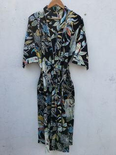 Cotton kimono robes are perfect for lounging around the home or spa. Use our Bird print robe as a cover up on the beach or after a dip in the pool. Add a luxe, boho feel to your bridal shower. Versatile, soft and luxurious, our 100% cotton kimono robes are printed with azo-free dyes. The print paisley robe features 3/4th sleeves, a waist tie and two front pocket. Size - One size will fit sizes S to XL Length - 50 inches (125 Centimeter), mid calf Note: Girl wear the kimono has height 5.3' feet M Long Maxi Gowns, Luxe Boho, Cotton Caftan, Bath Robes For Women, Monkey Print, Kimono Robes, Summer Kimono, Printed Robe, Indian Block Print