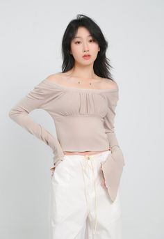 With all the comfort of a casual tee and the style of a dressy top, this crop top is a must-have for your wardrobe. A lightweight and airy fabric makes this crop top a perfect choice for a hot day or a night out on the town. The ruched front detail adds a touch of glamour, while the flare sleeves keep things interesting.
Gender: WomenMaterial: PolyesterClothing Length: ShortSleeve Length: Long SleeveSleeve Type: Angel Sleeve Trendy Crop Top In Solid Color, Solid Color Trendy Crop Top, Casual Cropped Off-shoulder Top For Summer, Fitted Long Sleeve Cropped Shirt For Summer, Chic Fitted Crop Top, Fitted Solid Color Top For Spring, Casual Stretch Cropped Off-shoulder Top, Chic Spring Crop Top For Day Out, Casual Fitted Off-shoulder Crop Top