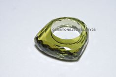 Buyers will receive 1 piece olive green quartz full faceted ring/ rectangle shaped top .This item is so beautiful and attractive .you will really love it. Product - Olive Green Quartz Full Faceted Ring Gemstone - Quartz (Lab Created) Quantity - 1 Piece Note - Please choose your ring size from the variation drop down menu. If you want our product in more quantity then please feel free to contact us we can make you provide as much as quantity as you want as we have our own manufacturing unit Modern Green Crystal Gemstone Ring, Diamond Ring Cuts, Faceted Ring, Green Quartz, Pink Quartz, Rock Crystal, Crystal Rings, Rectangle Shape, Olive Green