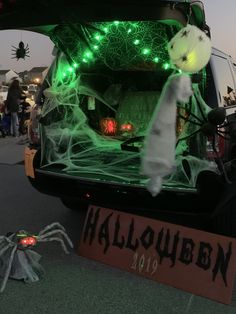 a van decorated with halloween decorations and lights