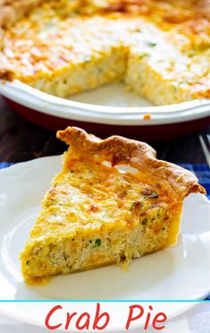 a slice of crab pie on a plate with the rest of the pie in the background