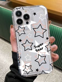 a person holding up a clear phone case with stars and the words super story on it