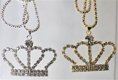 Gold or Silver Jewel Encrusted Crown Pendant, These crown necklaces are perfect for all royalty with all their rhinestones. They would make an exceptional gift for a fashionista. They are exquisite and would make an excellent charm or just as a collectible for the designer at heart. The are about 1.5 in x 2 in and they come with a 28" chain. Party Rhinestone Pendant Necklace With Bling, Party Pendant Rhinestone Necklace With Bling, Gift Rhinestone Necklace With Sparkling Stones, Elegant Crown Jewelry With Bling, Formal Rhinestone Pendant Necklace, Silver Crystal Jewelry With Crown Design, Crown Shaped Rhinestone Jewelry For Gifts, Crystal Crown Jewelry For Gifts, Classic Crown-shaped Jewelry As A Gift