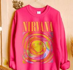 Top Seller for Nirvana Smiley Face Sweatshirt; Nirvana Aesthetic Pink Rainbow Unisex Sweatshirt, Women's clothing Pink Nirvana, Nirvana Aesthetic, Nirvana Hoodie, Nirvana Sweatshirt, Nirvana Smiley Face, Smiley Face Sweatshirt, Nirvana Shirt, Preppy Sweatshirts, Yellow Smiley Face