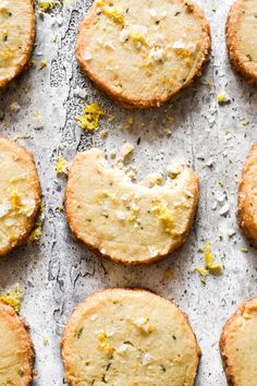 freshly baked cookies with lemon zest on a baking sheet ready to be eaten for breakfast