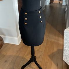 Never Worn Black H&M Skirt. Kick Pleat At Back. Gold Buttons On Front. 19” Long Pet Free. Smoke Free Home. Chic Fitted Skort With Button Closure, Chic H&m Pencil Skirt, Chic Black Buttoned Mini Skirt, Chic Black Mini Skirt With Buttons, Chic Fitted Skort With Buttons, High Waist Mini Skirt By H&m, Chic H&m Mini Skirt For Party, Chic H&m Skirt For Night Out, H&m Black Mini Skirt For Work