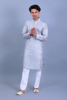 BLUESAANCHI MEN'S GREY EMBROIDERY KURTA SET  This exquisite Grey Embroidery Kurta Set from BLUESAANCHI combines traditional elegance with modern style. Perfect for festive occasions or casual gatherings, it features intricate embroidery that adds a touch of sophistication to your wardrobe.  Features  Elegant grey color with detailed embroidery.  Comfortable and breathable fabric.  Ideal for festive occasions and casual outings.   Specifications  Brand: BLUESAANCHI  Available Sizes: S, M, L, XL  Set Includes: Kurta and Pajama   Material & Care  Material: Cotton blend  Care Instructions: Hand wash separately in cold water, do not bleach, and line dry in shade.    Legal Disclaimer:  The product is guaranteed to be 100% genuine. Product images are for illustrative purposes only. Images/packagi Embroidery Kurta, Grey Embroidery, Detailed Embroidery, Embroidery Motifs, Intricate Embroidery, Kurta Set, Packaging Labels, Product Images, Grey Color